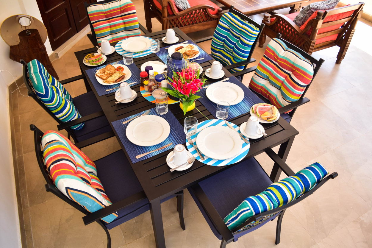 Breakfast set up on the table at Tahira Villa Diani.